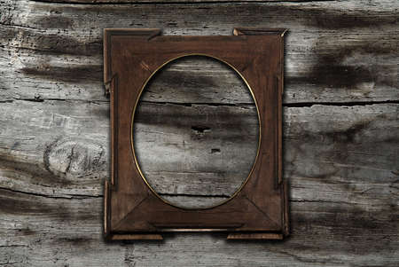 blank frame on old wooden backgroundの写真素材