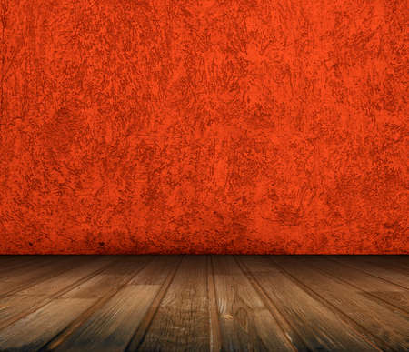 old room with concrete wall and wooden floor, red backgroundの写真素材