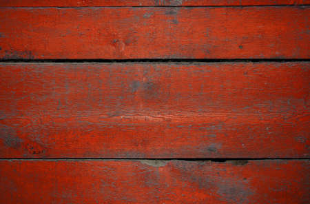 painted old wooden wall. red background の写真素材