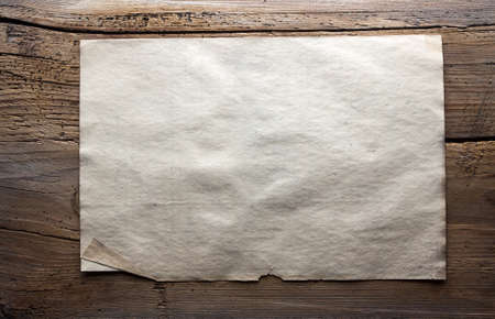 old paper on dirty wooden の写真素材