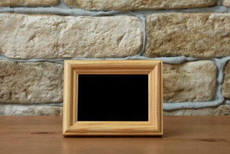 old photo frame on the wooden table