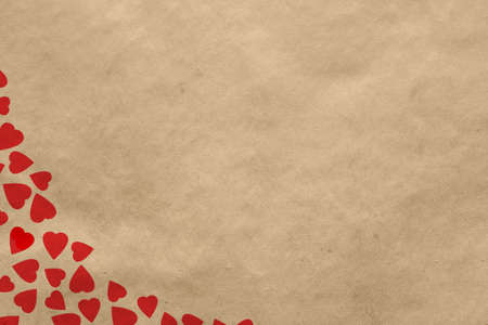 Valentine's day vintage background with hearts on old paper texture の写真素材