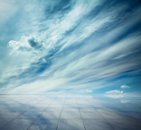blue sky and mirror floor, cloudy background の写真素材