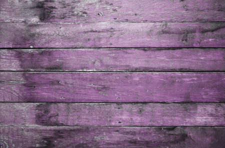 old dirty wooden wall, purple backgroundの写真素材