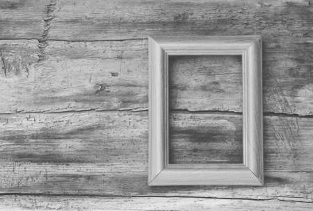 blank frame on old wooden gray backgroundの写真素材