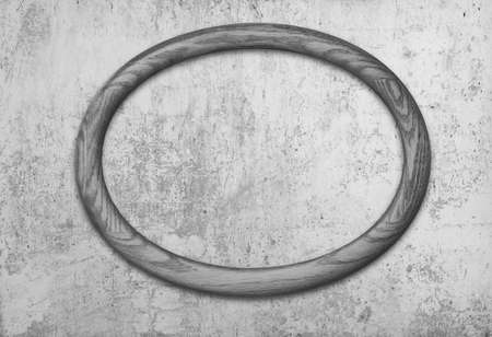 blank photo frame on old gray wallの写真素材