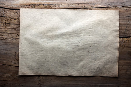 old paper on dirty wooden background