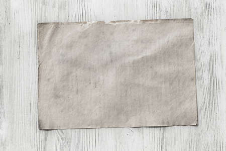 old paper on white wooden backgroundの写真素材