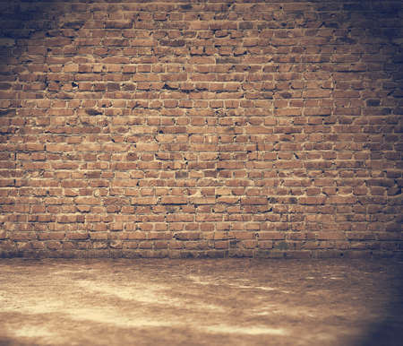 old grunge interior with brick wall, retro filteredの写真素材