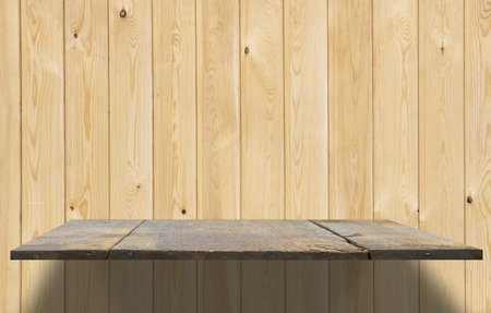 empty shelves on wooden wall