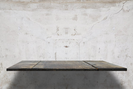 empty shelves on concrete wall