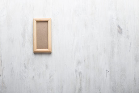 photo frame on white wallの写真素材