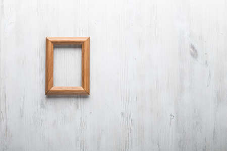 photo frame on white wallの写真素材