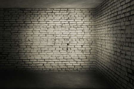 old room with brick wall, grungy backgroundの写真素材
