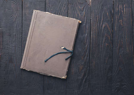 retro folder on old wooden backgroundの写真素材