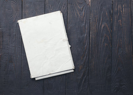 retro folder on old wooden background