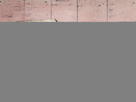 old paper on grunge pink wooden backgroundの写真素材