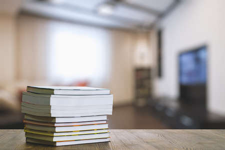 books on wooden table in the living roomの写真素材
