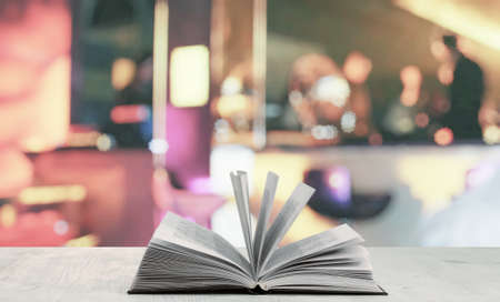 open book on white table in a night clubの写真素材