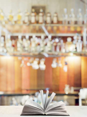 open book on white table in a night clubの写真素材