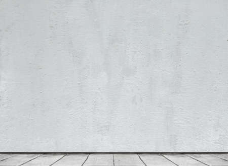 empty room with concrete wall and wooden floorの写真素材