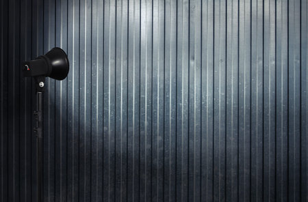 spot light on metallic wall
