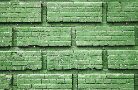 old wooden brick, green backgroundの写真素材