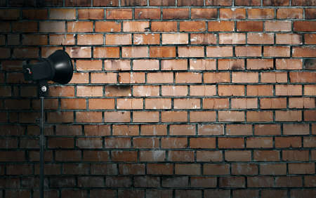 spot light on brick wallの写真素材