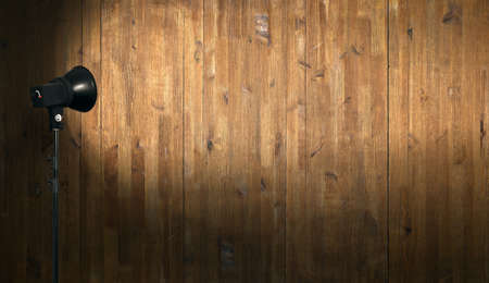 spot light on wooden wallの写真素材
