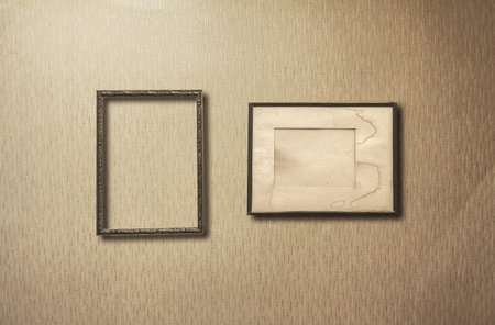 old photo frames on retro wallpaper