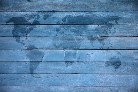 world map on old wooden wall