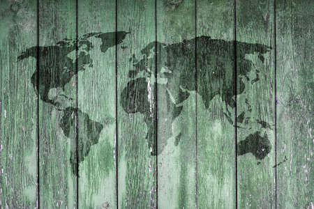 world map on old wooden wallの写真素材