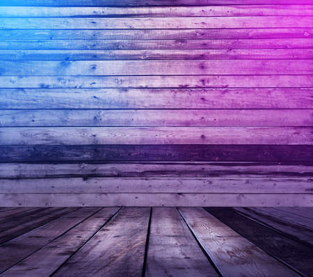 wooden interior background with neon lightsの写真素材