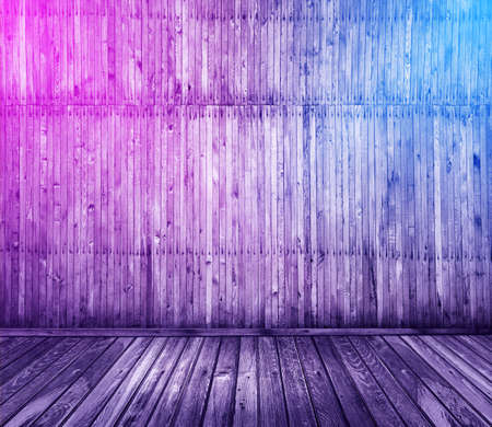 wooden interior background with neon lightsの写真素材