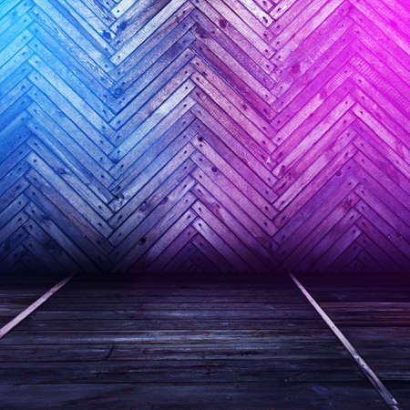 wooden interior background with neon lightsの写真素材