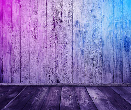 wooden interior background with neon lightsの写真素材