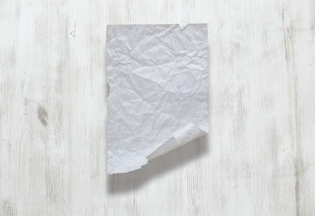 old paper on white wooden backgroundの写真素材