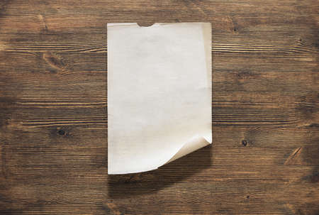 old paper on wooden backgroundの写真素材