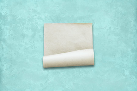 old paper on wall, mint blue background