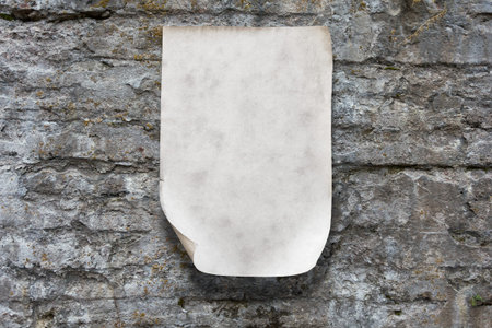 old paper on stone wallの写真素材