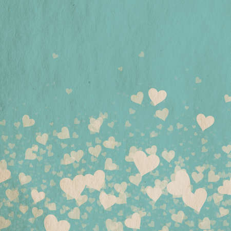 Vintage Valentine's day background, retro hearts on blue paperの写真素材