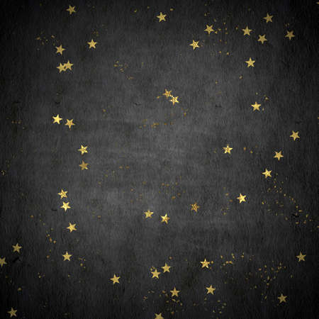 Christmas confetti, golden glitter texture on a dark background.の写真素材