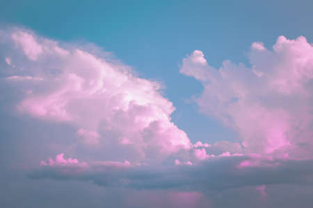 pink clouds, neon sky backgroundの写真素材