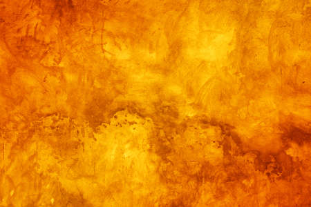 orange concrete background, old grunge plaster wallの写真素材