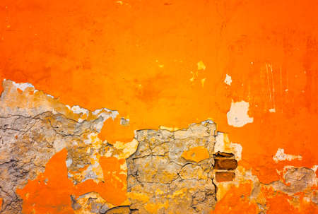 orange concrete background, old grunge plaster wallの写真素材