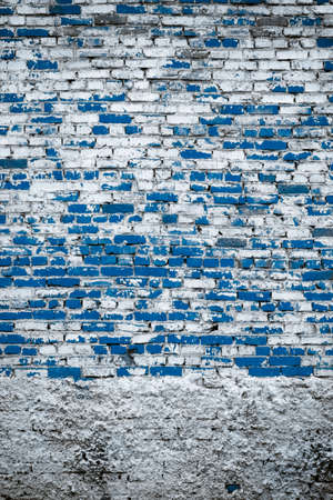 old brick wall. blue background.の写真素材