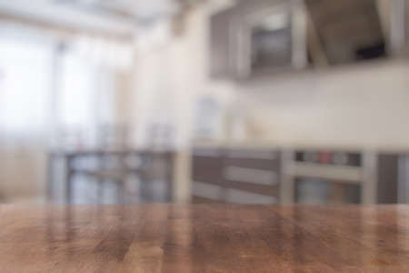 brown wooden table in the kitchenの写真素材