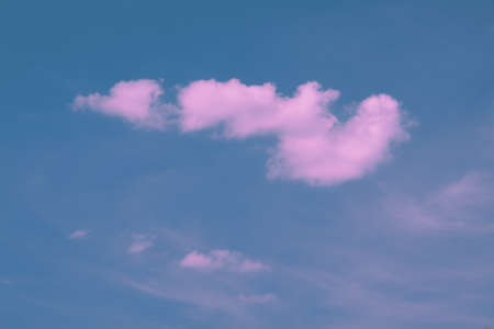 pink clouds, neon sky backgroundの写真素材