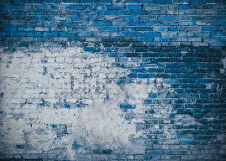 old brick wall. blue background.の写真素材
