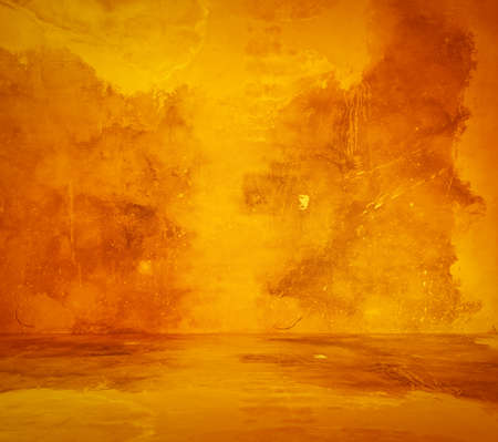 empty orange interior with concrete wall, plaster backgroundの写真素材